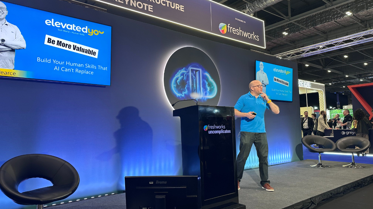 Picture of Ben on stage at Tech Show London