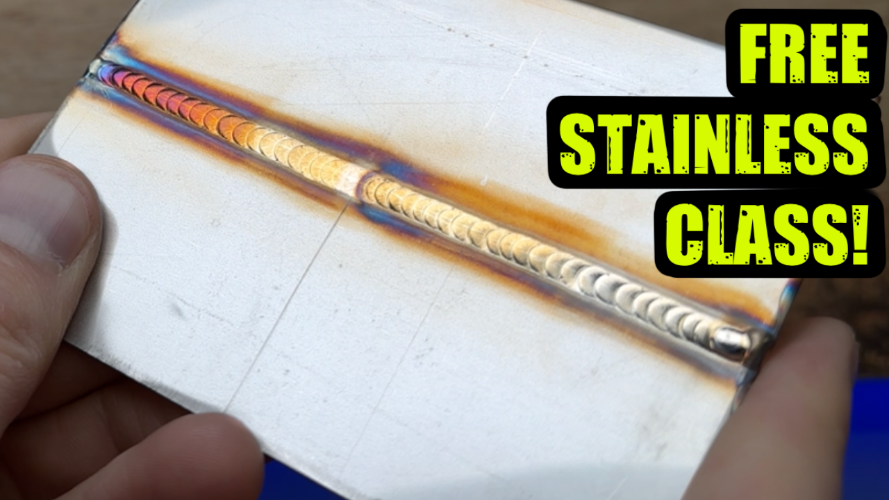 Hands holding a stainless steel TIG practice plate with a clean, colourful weld bead across the centre, with bold text saying “FREE STAINLESS CLASS!” in the top right corner.