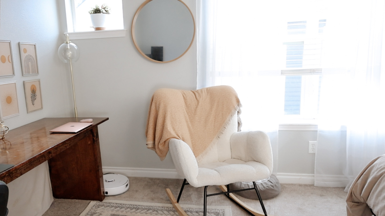 A finished bedroom with the bed straightened and furniture back in place