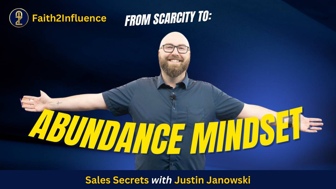 picture of Justin holding a sign that says abundance mindset
