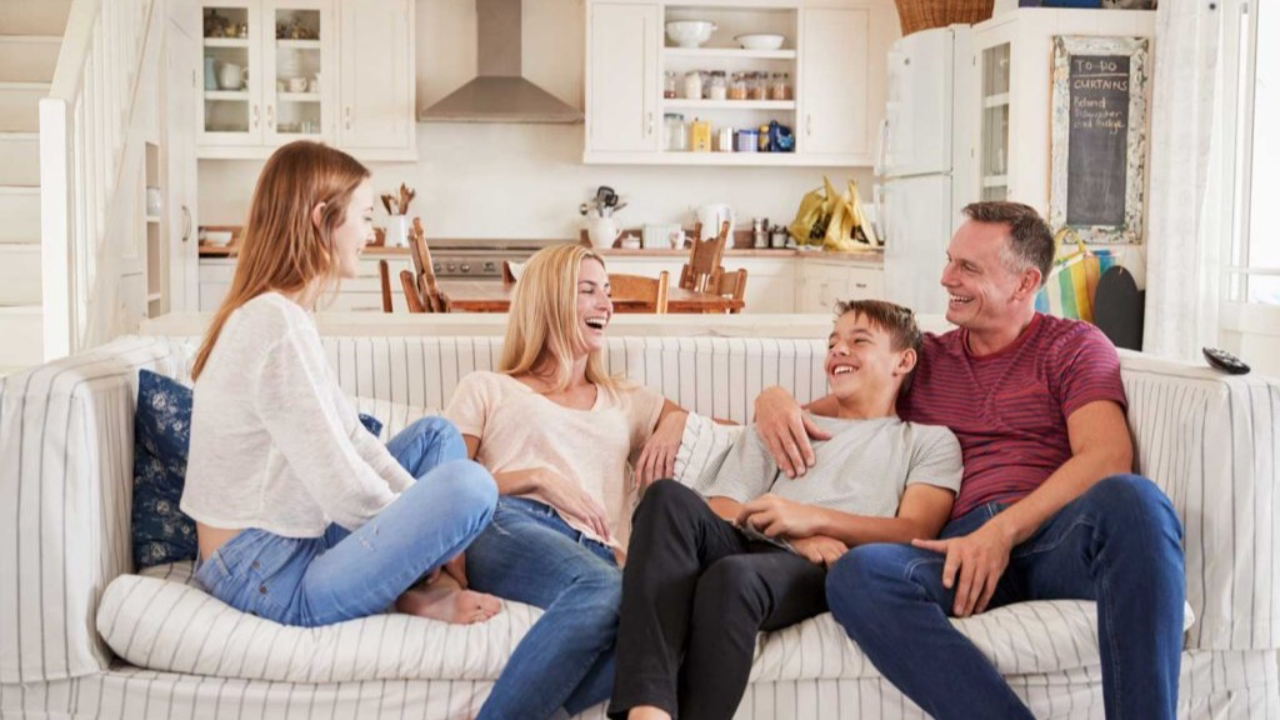 parents supporting their teen’s motivation and confidence during relaxed family conversation