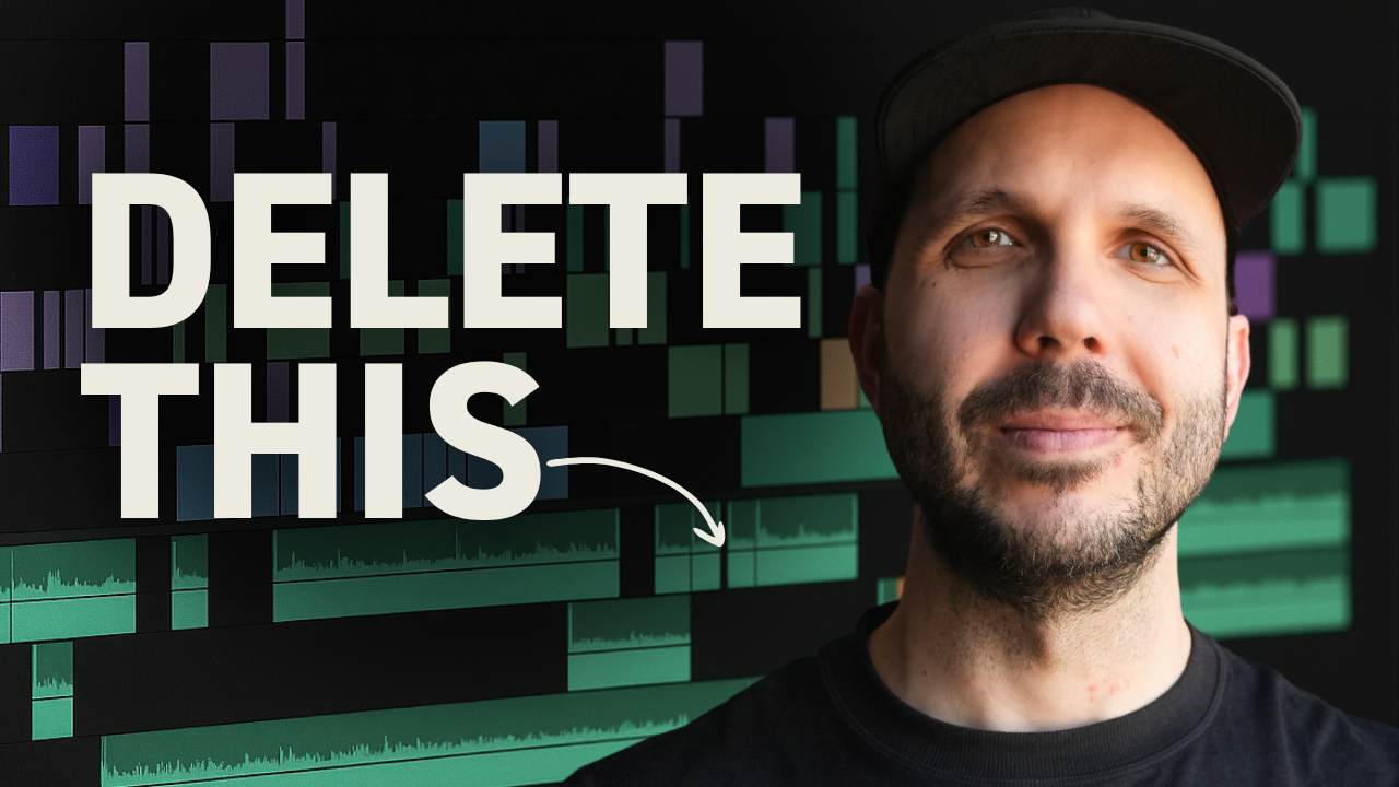 Professional video editor working on commercial project in editing suite with multiple monitors