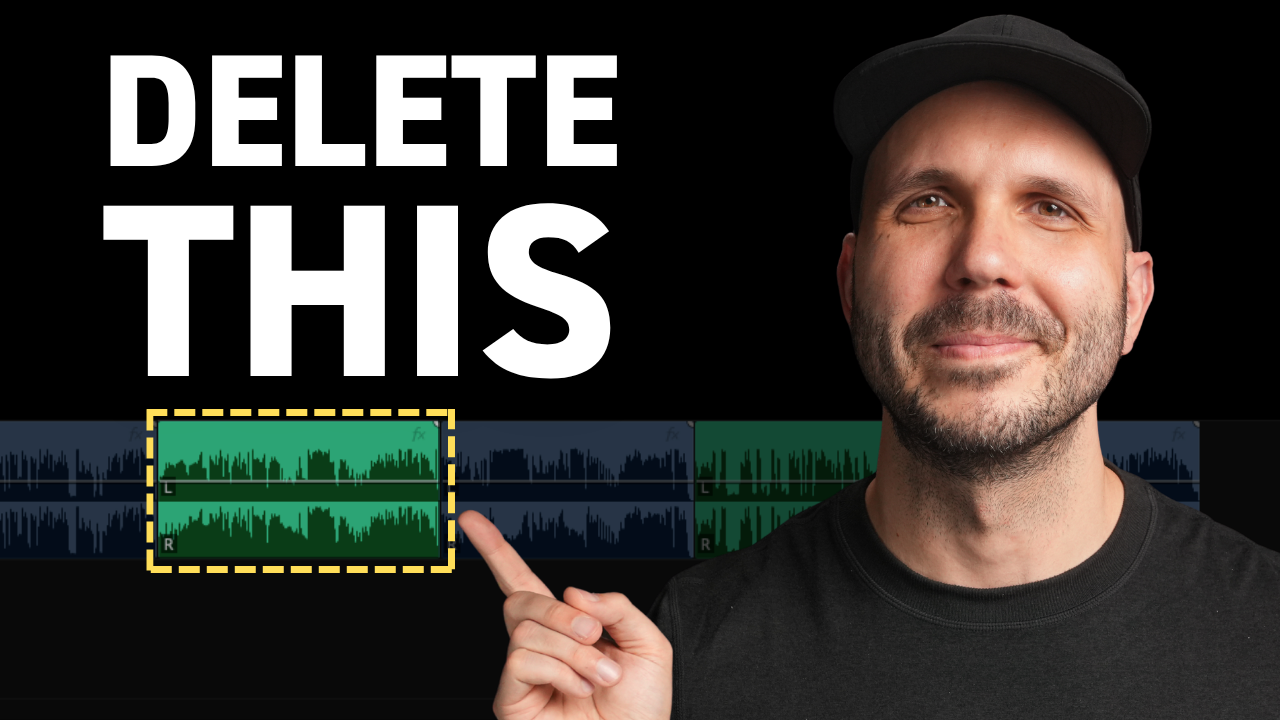 Professional video editor working on sound design for broadcast commercial in editing suite