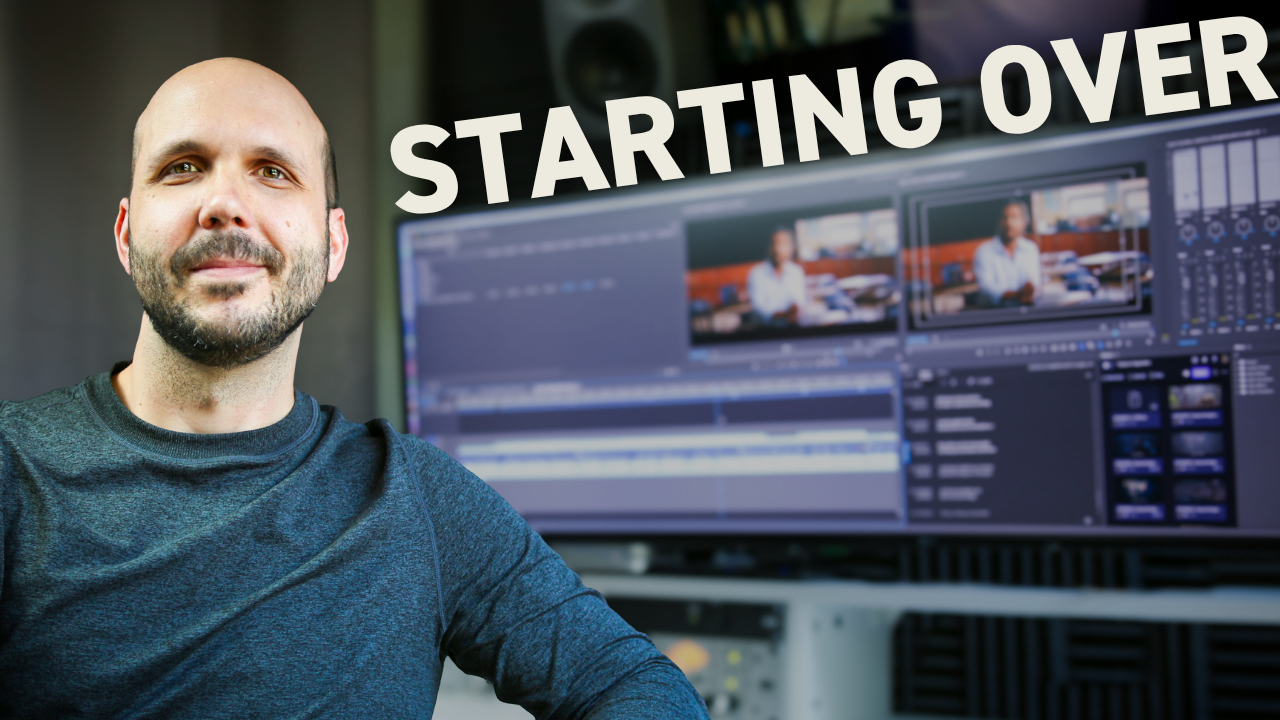 Video editor working at computer with timeline and professional footage displayed on screen