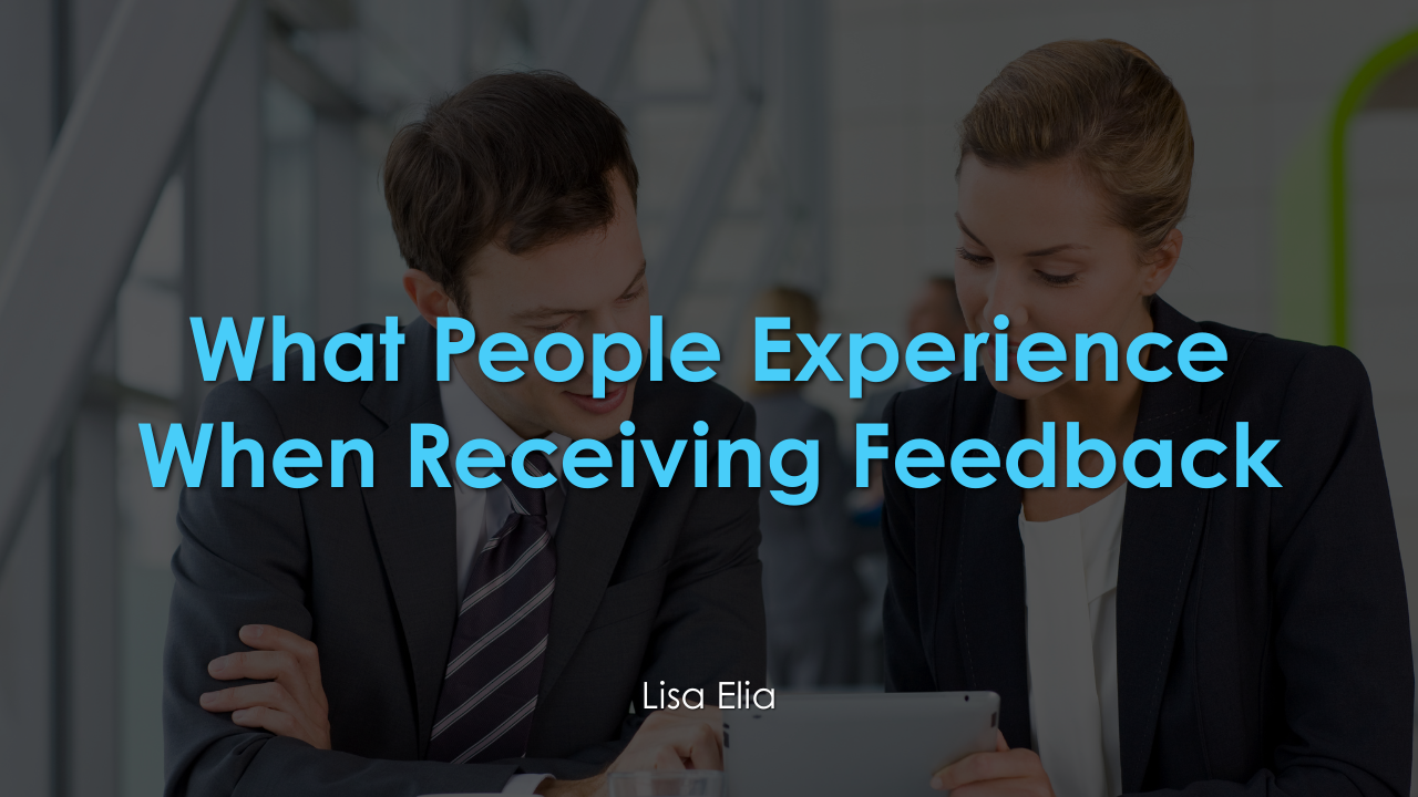 Photo of a meeting to accompany article by Leadership Communication Expert explaining What People Experience When Receiving Feedback.