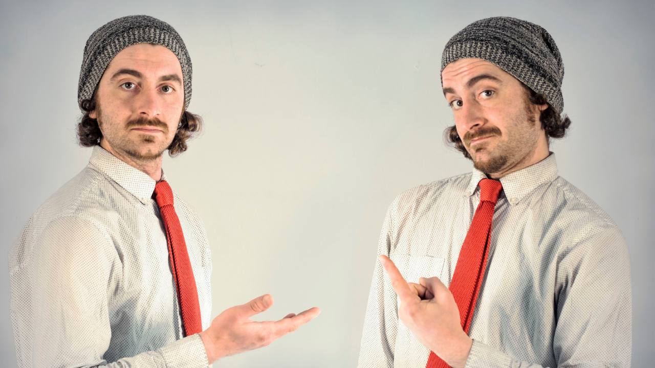 adult male twins wearing beanies and red ties