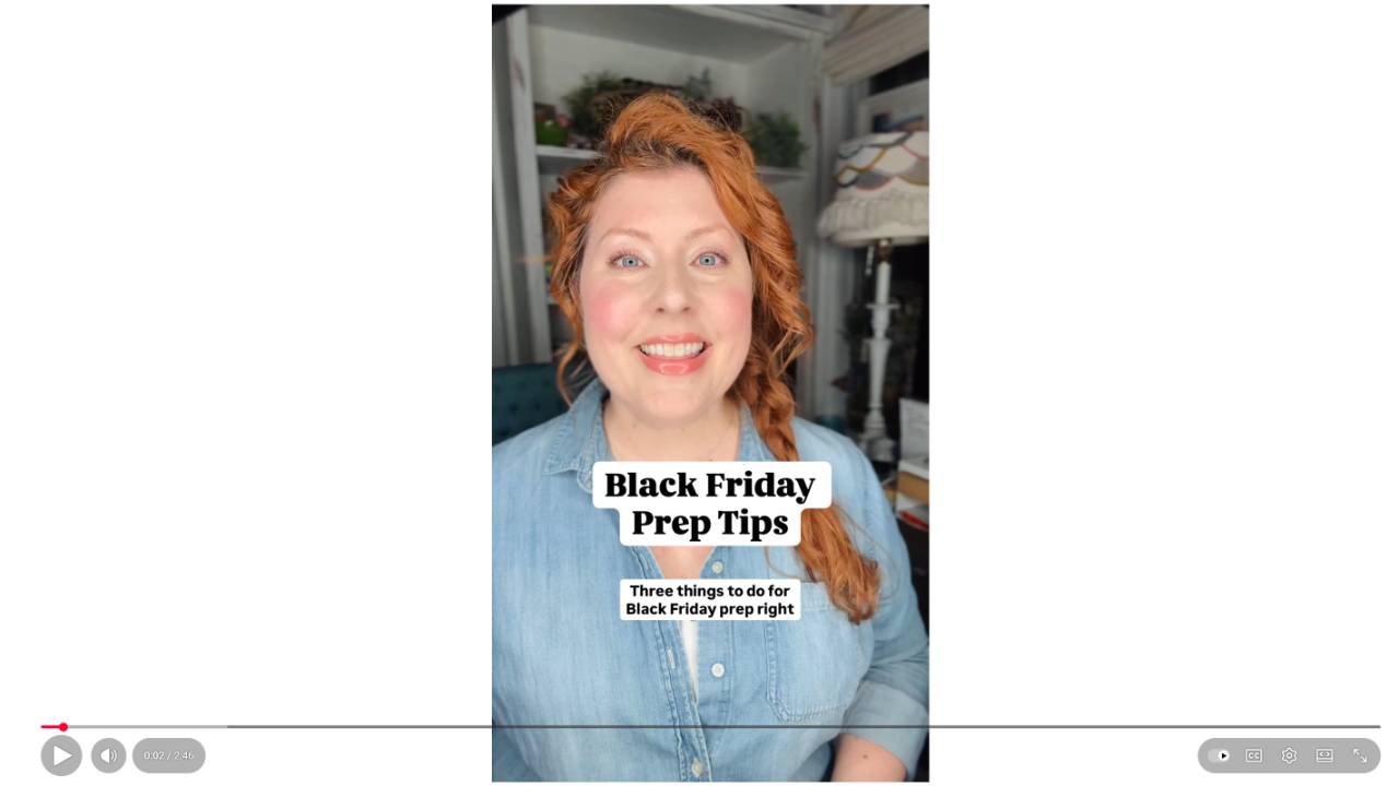 Black Friday Prep Tips IMAGE: redheaded white woman with braid smiling in denim button down