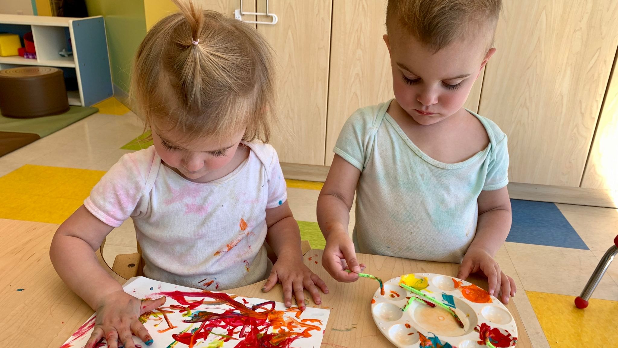 Kids are playing with colour