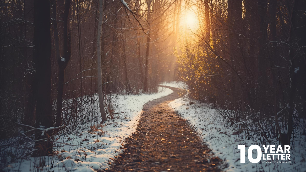 Winter forest trail with soft golden light, representing reflection, clarity, and the path toward your future self.