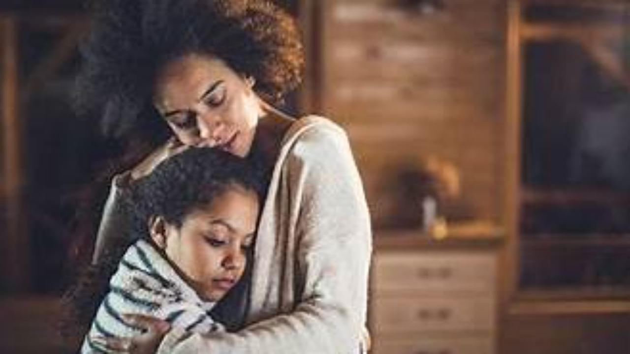 Parent supporting child's emotional resilience during divorce