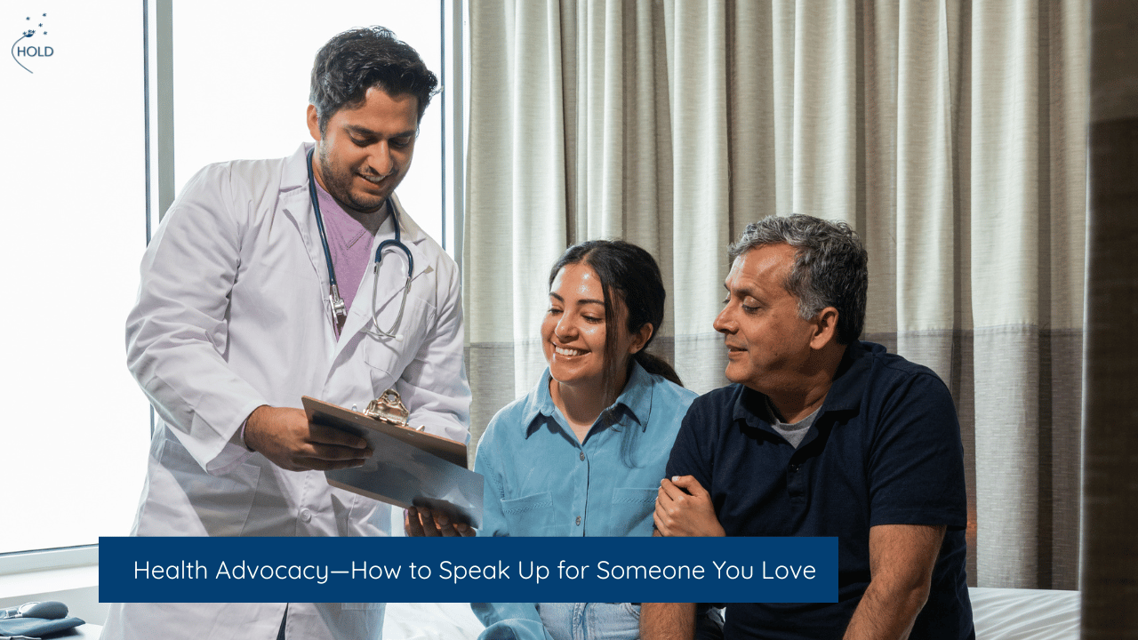 A doctor speaks with a patient and family member who is speaking up