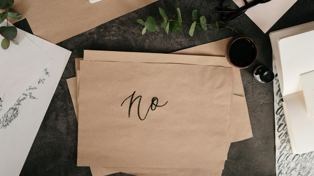 The word "No" written on a napkin