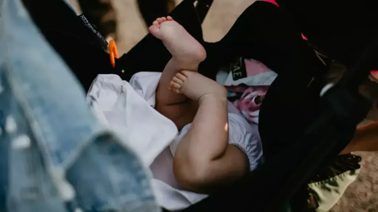 Sally and Kade's baby lying on BabyZen Yoyo+ Travel Stroller