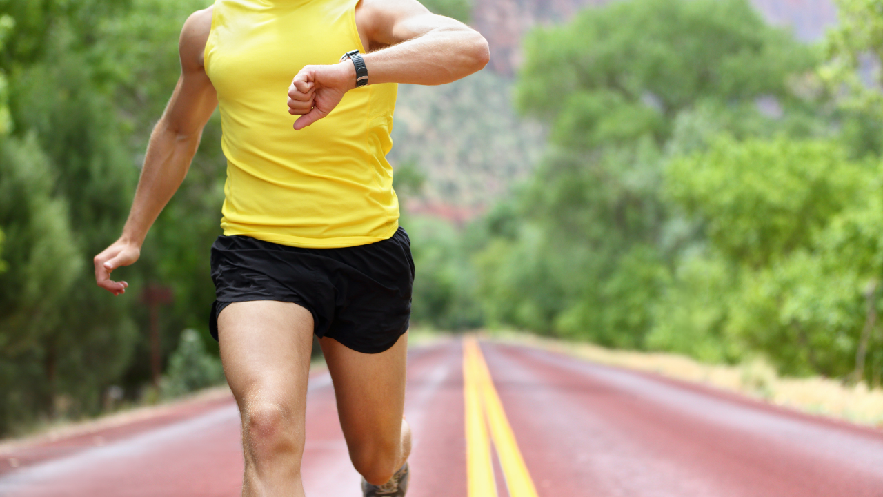 Runner checking heart rate