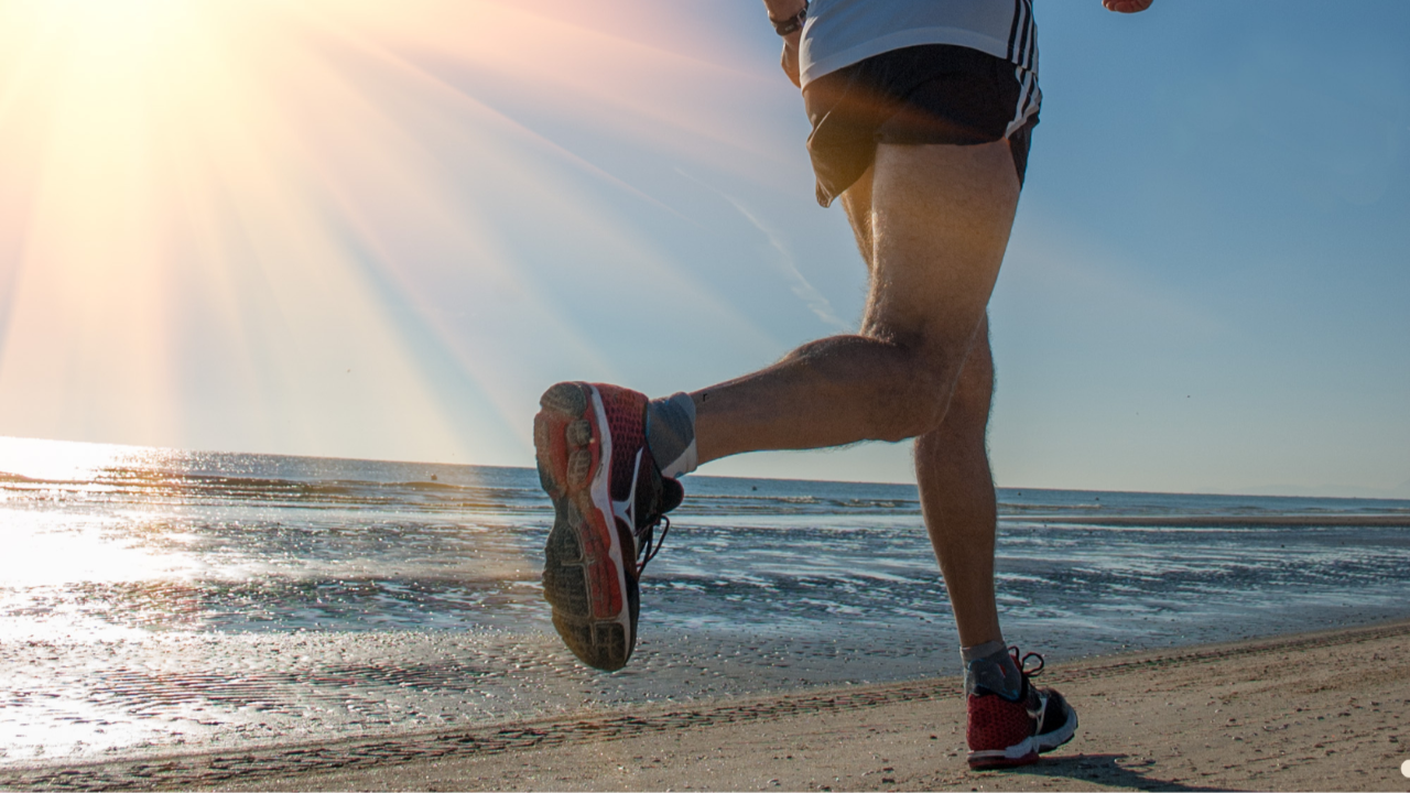 Person running outdoors with proper form