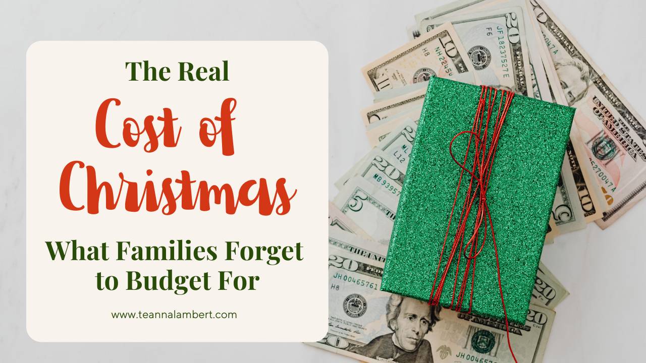 A green glittery Christmas gift wrapped with red string sits on a pile of U.S. dollar bills beside a text box that reads, “The Real Cost of Christmas: What Families Forget to Budget For” with the website teannalambert.com.