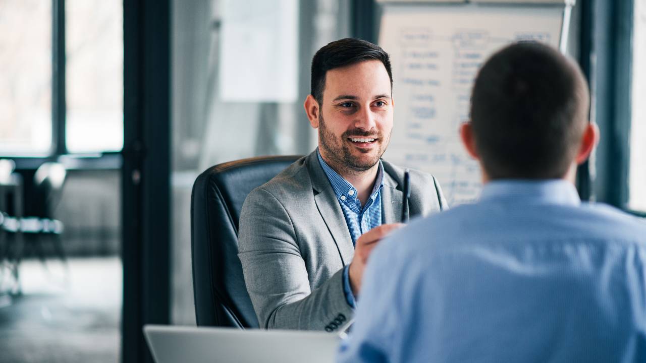 Two employees having a one-on-one conversation