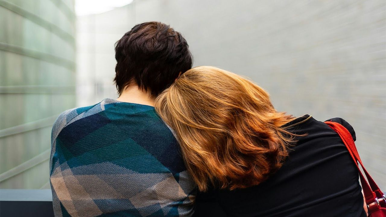 AHELP Project - Blog post, The Gift of Listening: What Pet Parents in Grief and Comfort Care Need Most, Image of someone putting their head on a friend's shoulder in support.