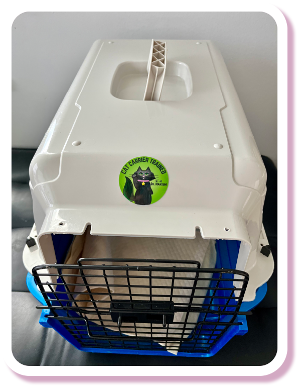 AHELP Project - Dr. Mansum's hard shell cat carrier with gate opening and screw off top with a comforting blanket inside.