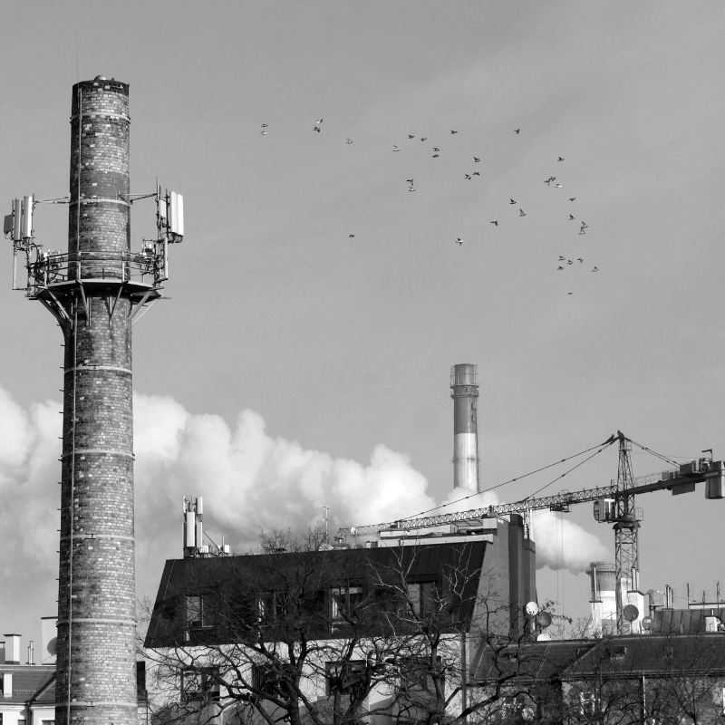 Industrial smokestack, black and white