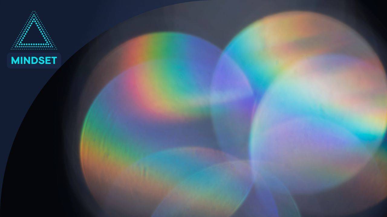 Abstract light refractions representing mindset, perception, and the invisible mental lens shaping how we experience reality