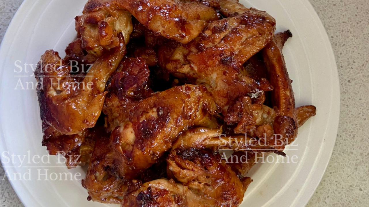      Honey Garlic and Ginger Wings on a plate