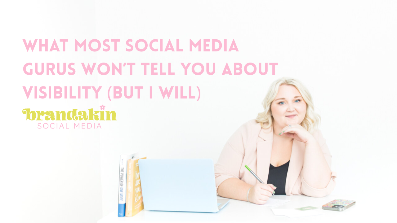 Woman in soft pink blazer sits at a desk smiling confidently with a pen in hand and laptop open. Text overlay reads: “What Most Social Media Gurus Won’t Tell You About Visibility (But I Will)” — Brandakin Social Media blog banner.