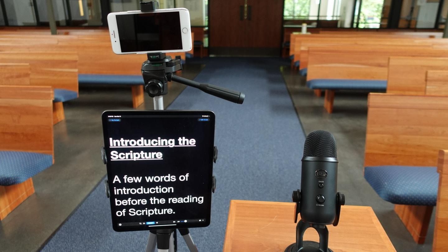 Small church worship service with simple setup, clear sound, and readable lyrics