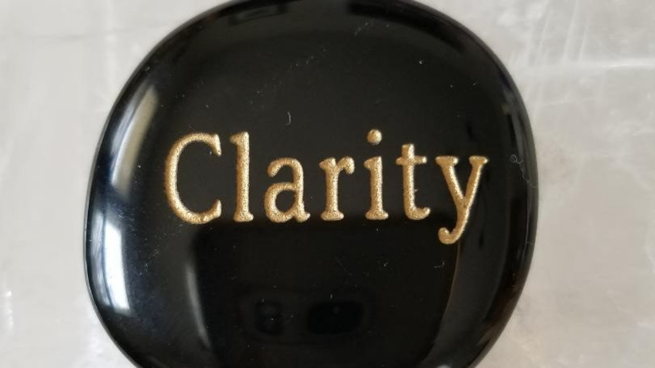 Black stone with the word CLARITY 
