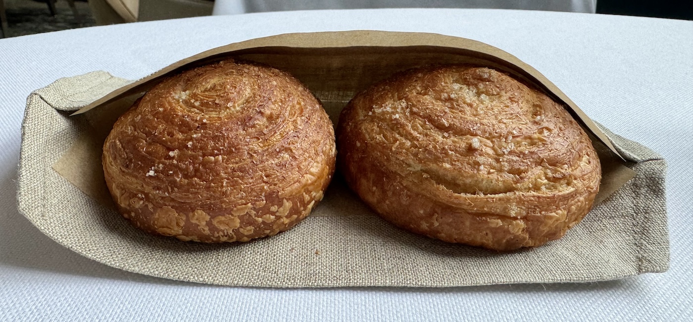 Two laminated bread rolls served at Eleven Madison Park