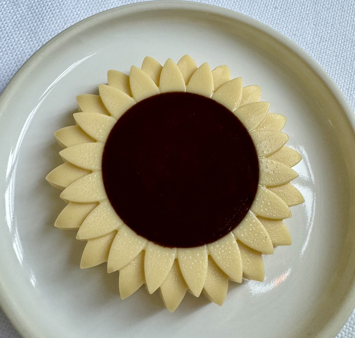 Artistic sunflower butter presentation at Eleven Madison Park