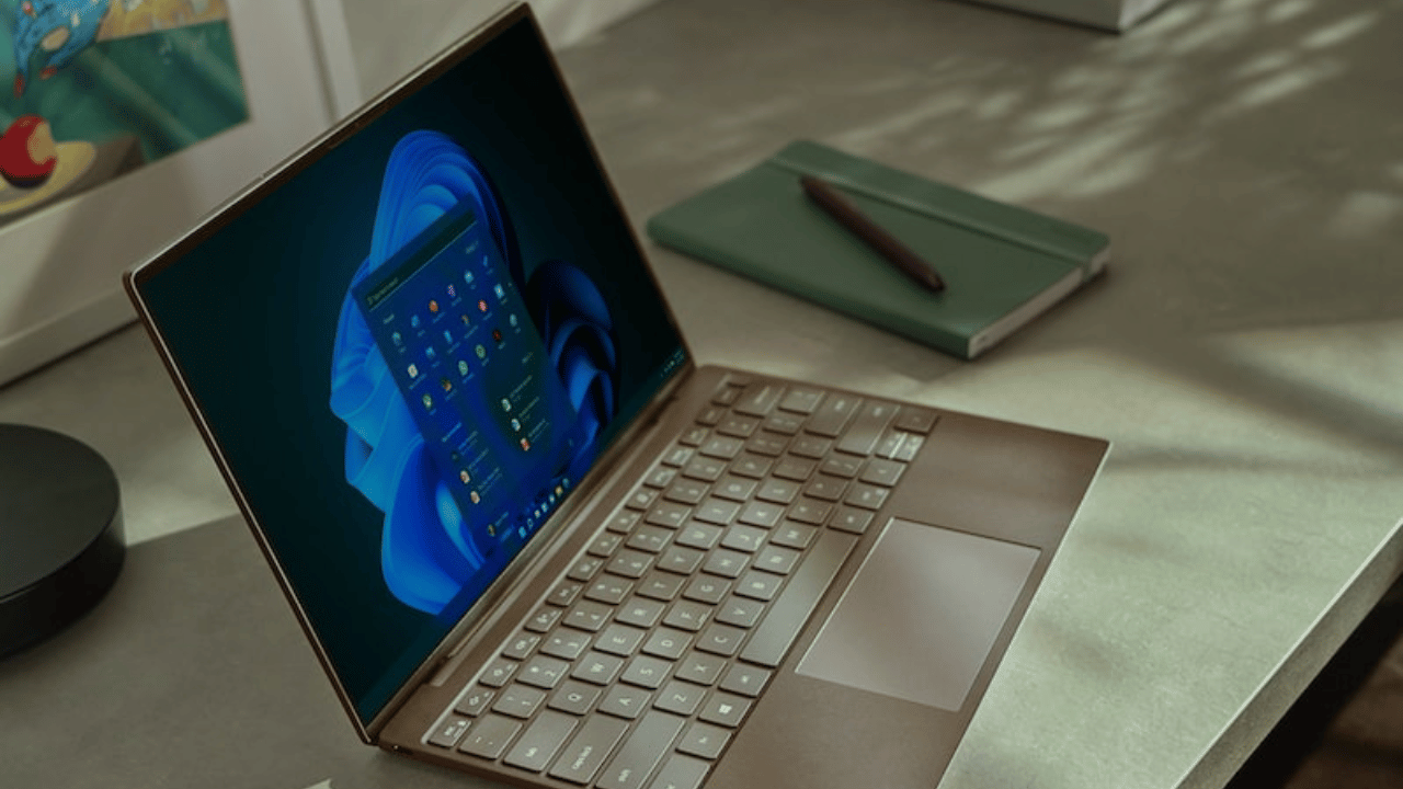 website design with storybrand approacha woman sitting at a table with a laptop