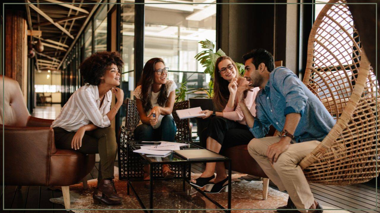 group of professional adults having a casual meeting