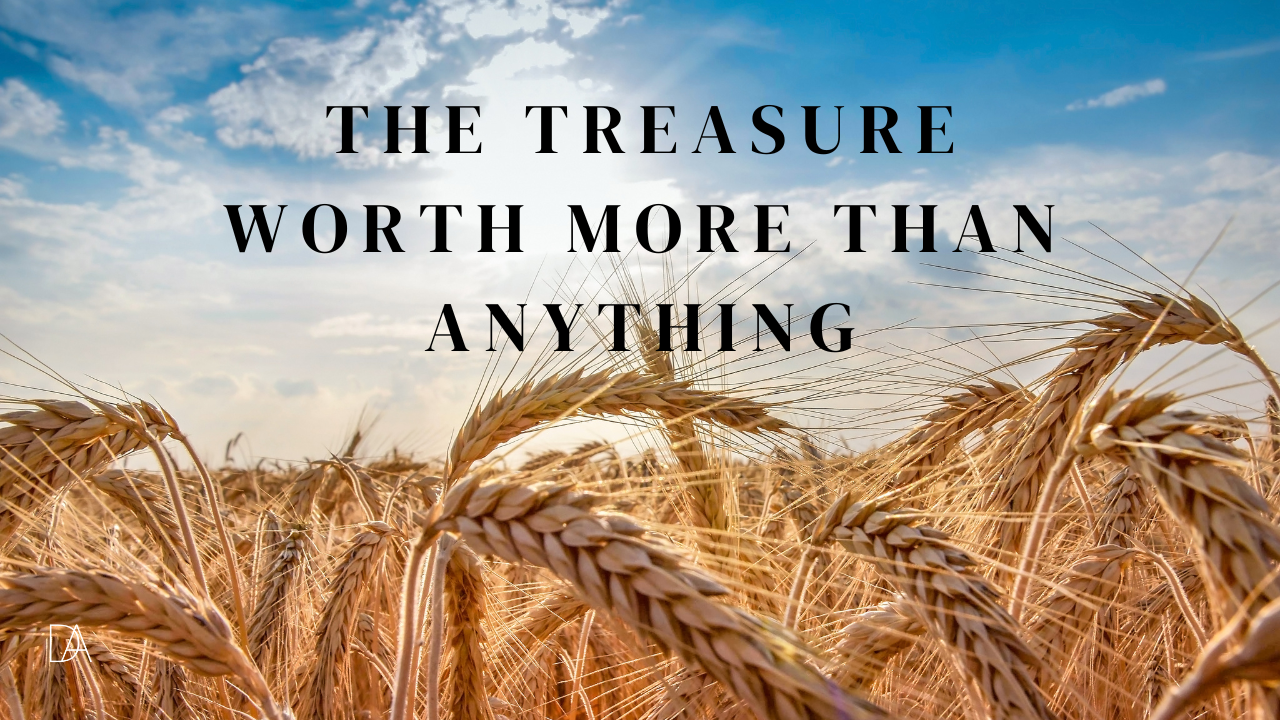 Golden wheat field under a bright blue sky with scattered clouds. Over the wheat, bold black text reads: ‘The Treasure Worth More Than Anything.’