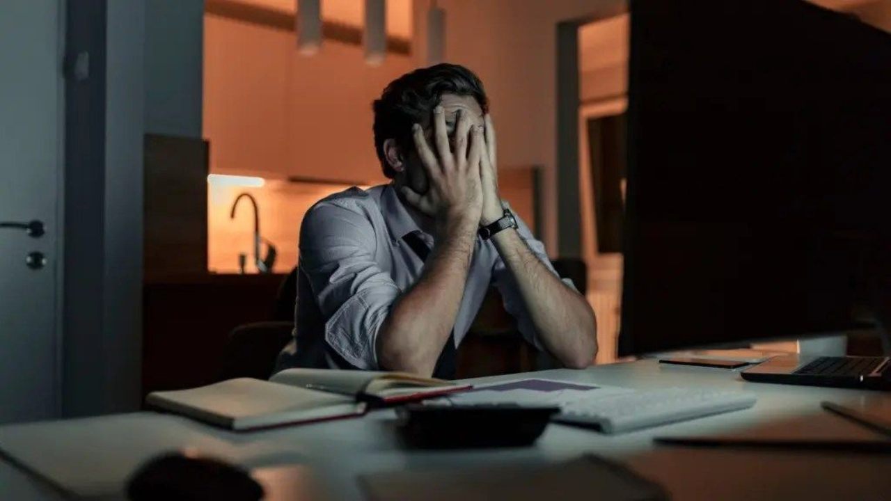 A stressed and overwhelmed male founder symbolizing burnout and the emotional toll of running a startup.