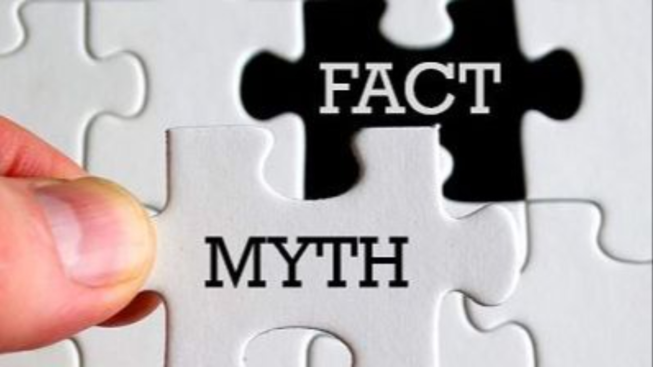 Debunking investing myths: A puzzle piece labeled "MYTH" is removed, revealing the "FACT" beneath, symbolizing how we overcome fear by replacing false beliefs with simple financial truths to achieve wealth.