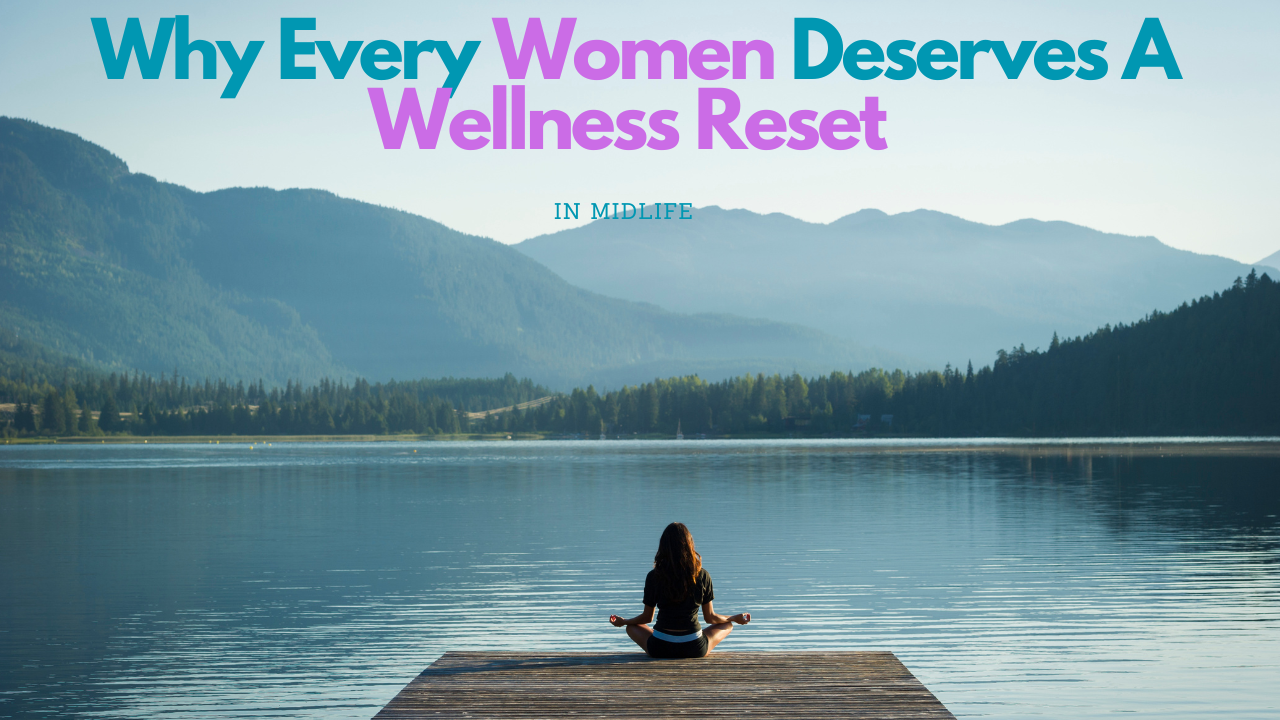 Woman in front of lake meditating