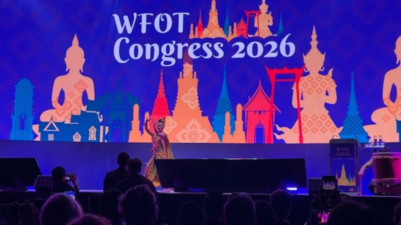 The WFOT Congress Stage, featuring a traditional thai dancer performing.