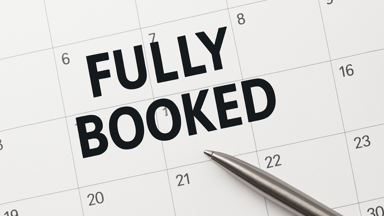 paper calendar with words Fully Booked across the calendar