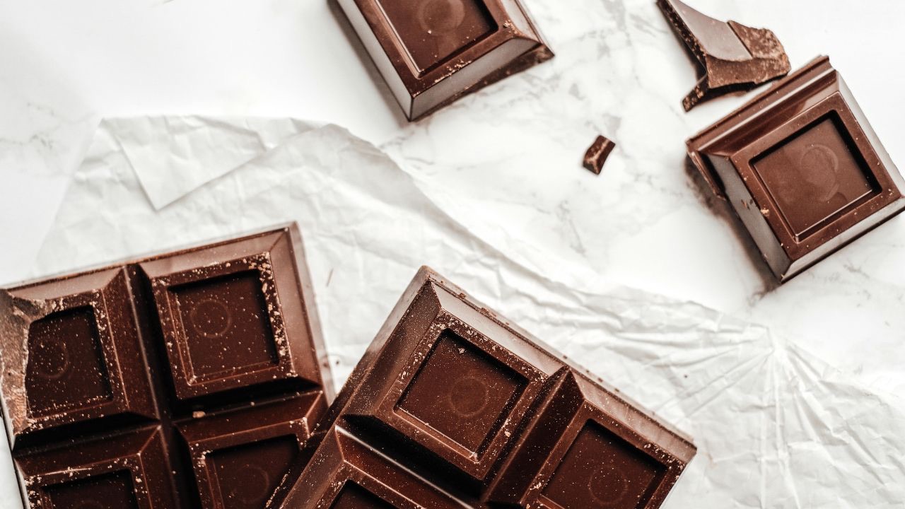 Struggle with binge foods like chocolate, chips, or cookies? Learn how to stop feeling out of control with triggering foods. A dietitian explains how to overcome binge eating, emotional eating, and 'food addiction' using intuitive eating to build food trust, body trust, and make peace with food.