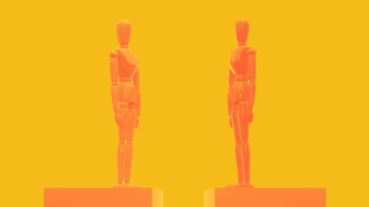 Two figures standing next to and facing eachother