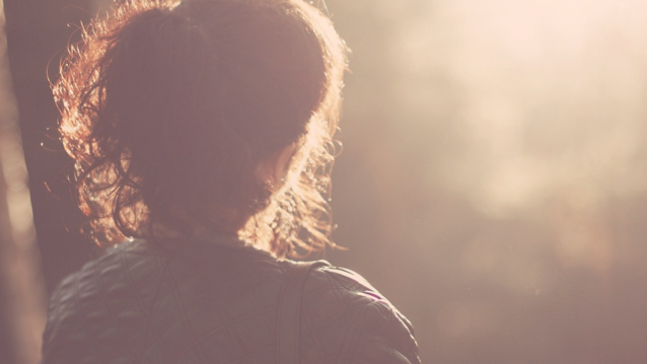 A woman looking out in nature