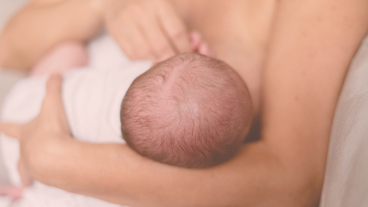 a baby breastfeeding