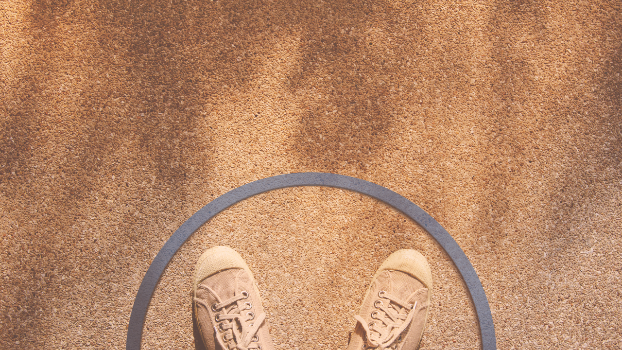 someone standing within a boundary circle