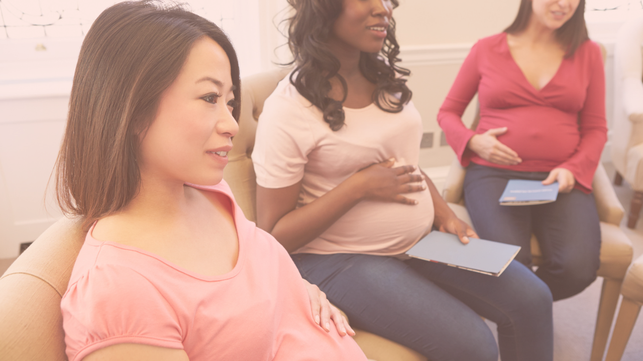 three pregnant women with their hands on their belly