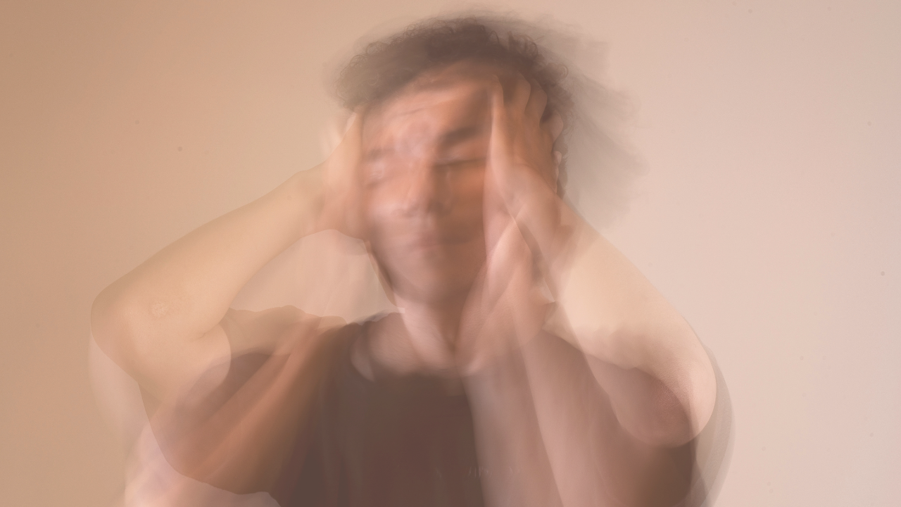 a blurred image of someone in a stressful state