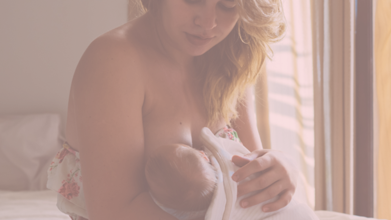 A mother breastfeeding her baby