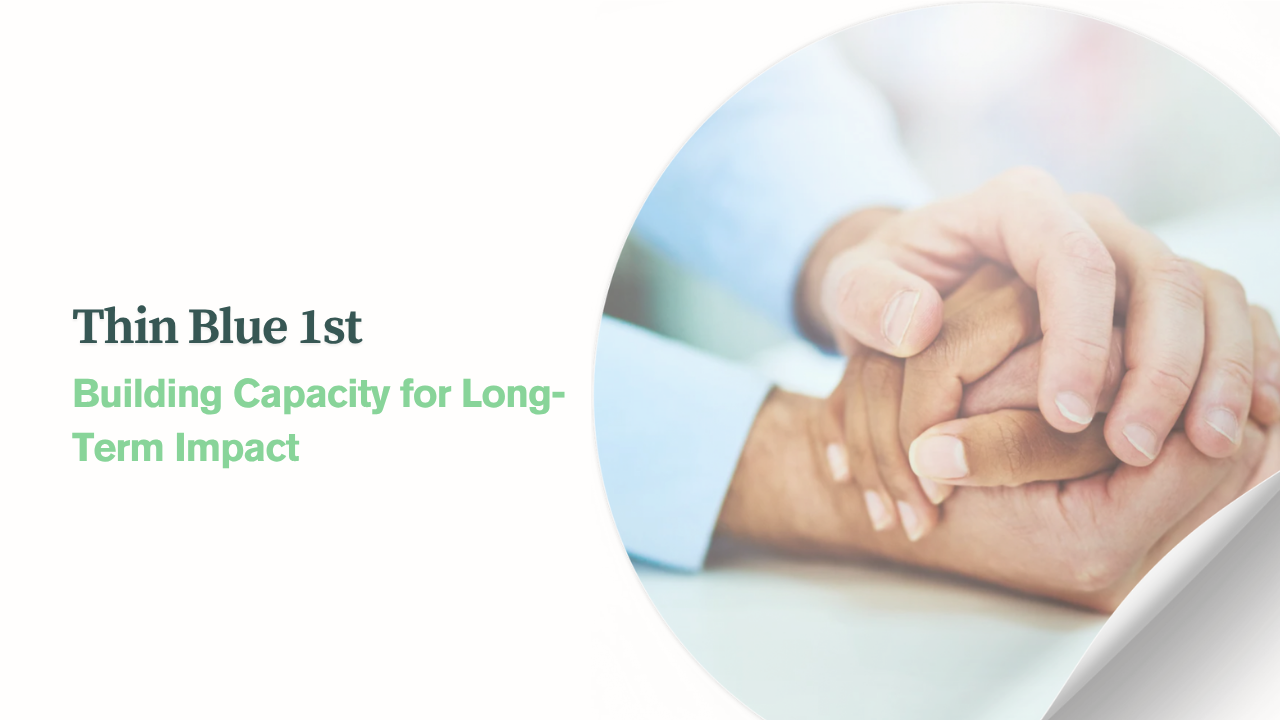 Close-up of two people holding hands in a gesture of support and care, symbolizing emotional and spiritual support for first responders