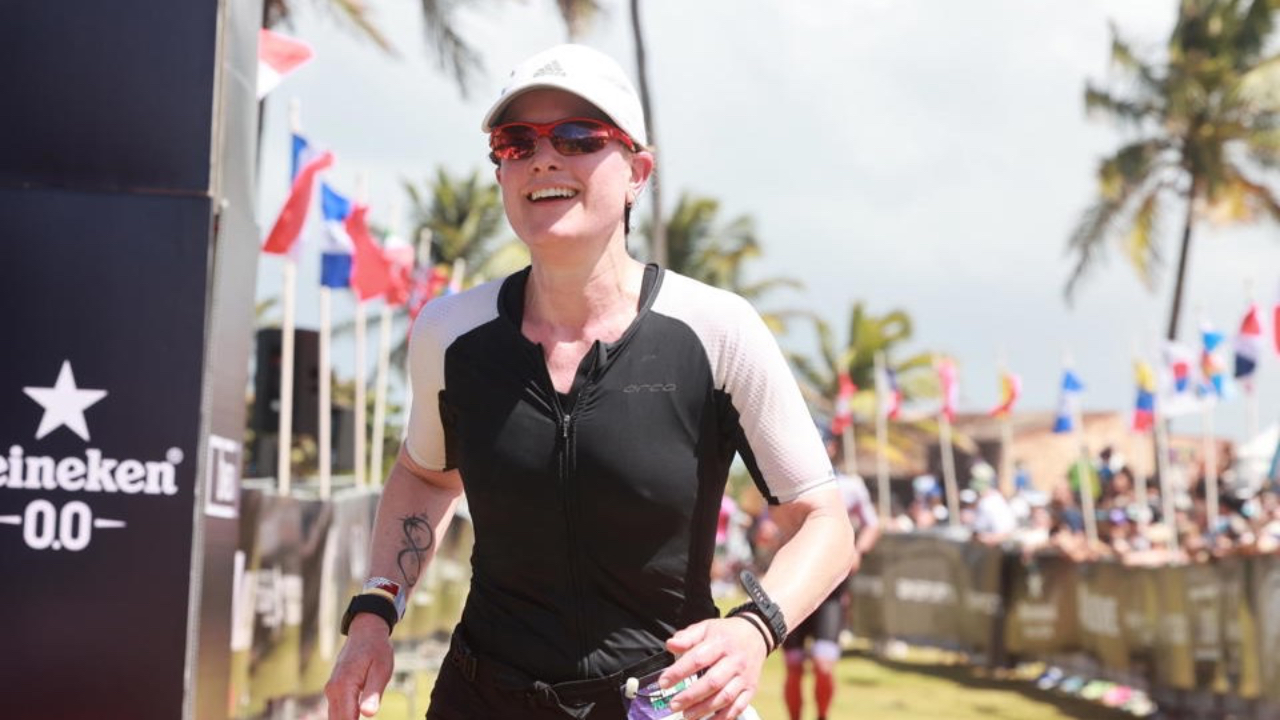 Author crossing 2026 IM 70.3 Puerto Rico finish line