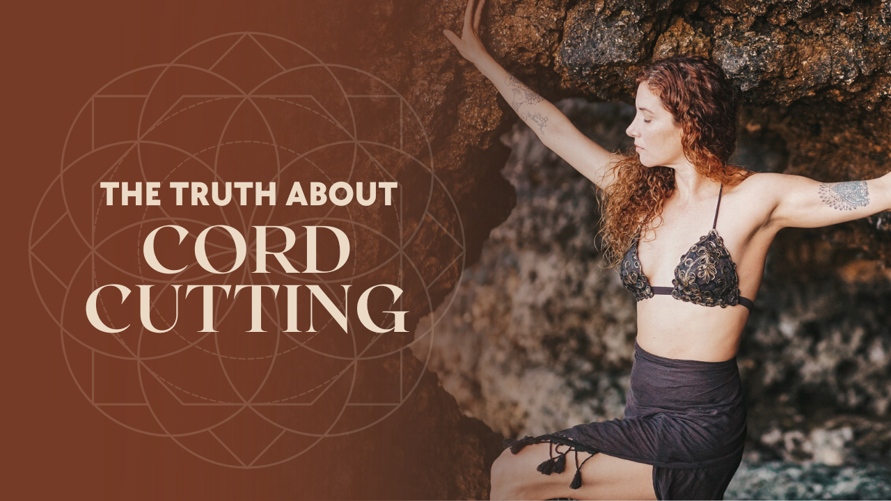 Lisa Rachel Snyder standing in a cave-like setting with her arms extended, symbolizing the truth about cord cutting and energetic sovereignty.
